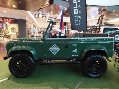 QUEZON CITY, PH - JUNE 12 - Land cruiser defender at Black Rhino wheels vehicle display on June 12, 2024 in Quezon City, Philippines. Concept one is a rims and wheel retail shop in Philippines. clipart