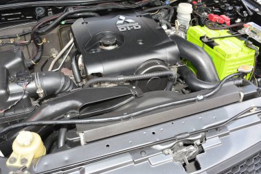 MANILA, PH - JAN 27 - Mitsubishi strada motoru 27 Ocak 2024 tarihinde Manila, Filipinler 'de Revolve Car Show' da. Revolve, Filipinler 'de San Beda Üniversitesi' nde düzenlenen yıllık bir otomobil fuarıdır..