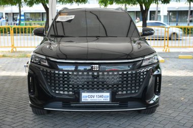 Pasay, PH - 11 Mayıs - Dfsk e5 11 Mayıs 2024 tarihinde Pasay, Filipinler 'de Autofest test sürüşünde. Autofest, Filipinler 'de her yıl düzenlenen bir test sürüşü otomobil etkinliğidir..