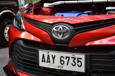 MANILA, PH-JAN 27 - Toyota vios 27 Ocak 2024 tarihinde Manila, Filipinler 'de Revolve Car Show' da. Revolve, Filipinler 'de San Beda Üniversitesi' nde düzenlenen yıllık bir otomobil fuarıdır..