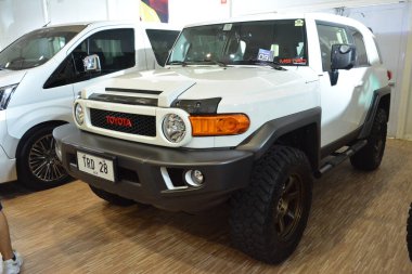 MUNTINLUPA, PH - JAN 28 - Toyota fj cruiser at Neo classic car show on January 28, 2024 in Muntinlupa, Philippines. Neo classic is a aftermarket car show event held in Philippines. clipart