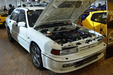 MUNTINLUPA, PH-JAN 28 - Mitsubishi Lancer 28 Ocak 2024 tarihinde Muntinlupa, Filipinler 'de Neo klasik araba fuarında. Neo Classic, Filipinler 'de düzenlenen bir pazar sonrası araba fuarıdır..