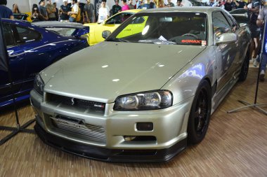 MUNTINLUPA, PH - JAN 28 - Nissan silueti 28 Ocak 2024 tarihinde Muntinlupa, Filipinler 'de Neo klasik araba fuarında. Neo Classic, Filipinler 'de düzenlenen bir pazar sonrası araba fuarıdır..