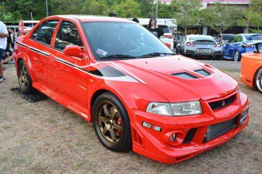 MUNTINLUPA, PH-JAN 28 - Mitsubishi Lancer evolution at Neo classic car show 28 Ocak 2024, Muntinlupa, Filipinler. Neo Classic, Filipinler 'de düzenlenen bir pazar sonrası araba fuarıdır..
