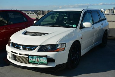 PARANAQUE, PH-3 - Mitsubishi Lancer evolution at Legit Manila 1620 car meet on 3 Şubat 2024, Paranaque, Filipinler. Legit Manila 1620, Filipinler 'de düzenlenen bir otomobil yarışması..