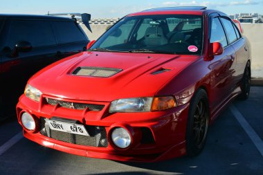 PARANAQUE, PH-3 - Mitsubishi Lancer evolution at Legit Manila 1620 car meet on 3 Şubat 2024, Paranaque, Filipinler. Legit Manila 1620, Filipinler 'de düzenlenen bir otomobil yarışması..