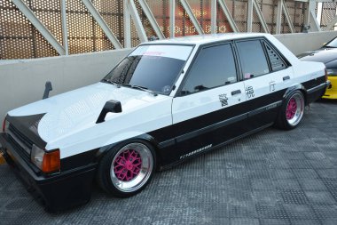 PARANAQUE, PH-3 - Mitsubishi Lancer Legit Manila 1620 'de 3 Şubat 2024' te Paranaque, Filipinler 'de buluşuyor. Legit Manila 1620, Filipinler 'de düzenlenen bir otomobil yarışması..