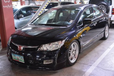 PARANAQUE, PH - 18 Şubat - Honda Civic, 18 Şubat 2024 tarihinde Paranaque, Filipinler 'de Yavaşla Pazar günü buluşacak. Pazar günü Filipinler 'de bir araba yarışması var..