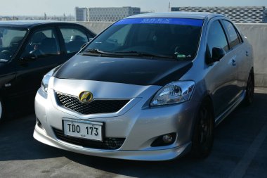 PARANAQUE, PH - MAR 3 - Toyota vios at media mix car meet on March 3, 2024 in Paranaque, Philippines. Media mix is a car meet event held in Philippines. clipart