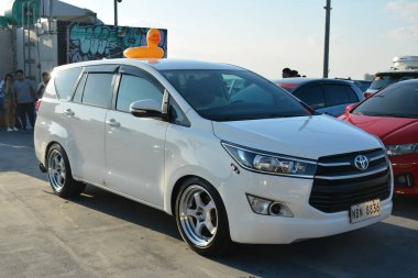 PARANAQUE, PH - MAR 3 - Toyota innova at media mix car meet on March 3, 2024 in Paranaque, Philippines. Media mix is a car meet event held in Philippines. clipart