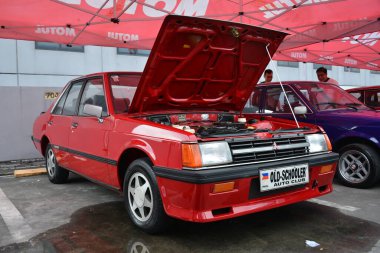 PASIG, PH - MAR 23 - Mitsubishi Lancer 23 Mart 2024 tarihinde Pasig, Filipinler 'de araba kulüpleri savaşında. Araba Kulübü Muharebesi, Filipinler 'de düzenlenen bir araba fuarıdır..