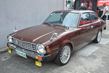 PASIG, PH - MAR 23 - Mitsubishi Lancer 23 Mart 2024 tarihinde Pasig, Filipinler 'de araba kulüpleri savaşında. Araba Kulübü Muharebesi, Filipinler 'de düzenlenen bir araba fuarıdır..