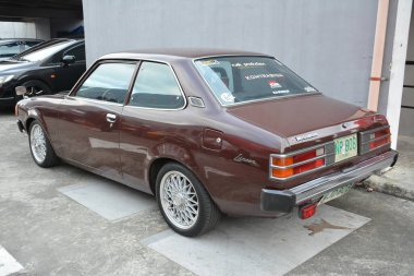 PASIG, PH - MAR 23 - Mitsubishi Lancer 23 Mart 2024 tarihinde Pasig, Filipinler 'de araba kulüpleri savaşında. Araba Kulübü Muharebesi, Filipinler 'de düzenlenen bir araba fuarıdır..