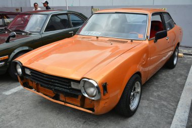 PASIG, PH - MAR 23 - Mitsubishi Lancer 23 Mart 2024 tarihinde Pasig, Filipinler 'de araba kulüpleri savaşında. Araba Kulübü Muharebesi, Filipinler 'de düzenlenen bir araba fuarıdır..