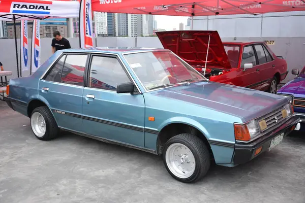PASIG, PH - MAR 23 - Mitsubishi Lancer 23 Mart 2024 tarihinde Pasig, Filipinler 'de araba kulüpleri savaşında. Araba Kulübü Muharebesi, Filipinler 'de düzenlenen bir araba fuarıdır..