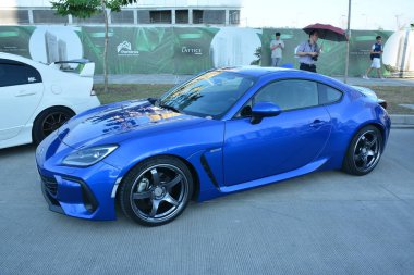 PASIG, PH - APR. 21 - Subaru Brz 21 Nisan 2024 'te Filipinler, Pasig' de Angie King ile arabada buluştu. Angie King bir araba meraklısı ve Filipinler 'de bir araba yarışması düzenledi..