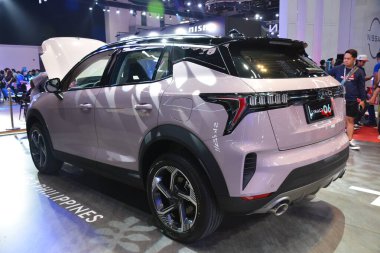 Pasay, PH - APR 6 - Lynk and Co 06 Manila Uluslararası Otomobil Fuarı 'nda 6 Nisan 2024 tarihinde Pasay, Filipinler' de. Manila International Auto Show, Filipinler 'de her yıl düzenlenen bir otomobil fuarıdır..