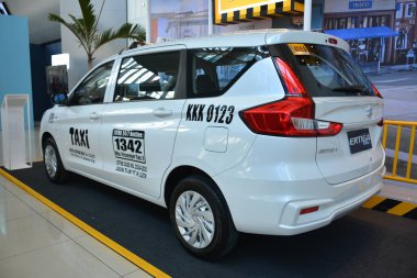 Pasay, PH - 20 Temmuz - Suzuki ertiga hybrid Filipin ticari araç fuarında 20 Temmuz 2024 tarihinde Pasay, Filipinler 'de. Filipin ticari araç fuarı Filipinler 'de yıllık bir kamyon fuarıdır..