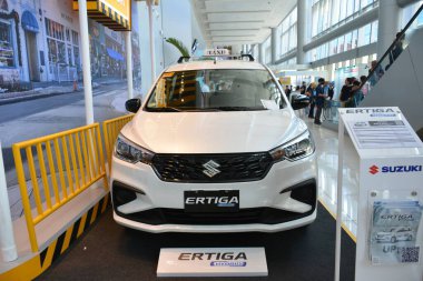 Pasay, PH - 20 Temmuz - Suzuki ertiga hybrid Filipin ticari araç fuarında 20 Temmuz 2024 tarihinde Pasay, Filipinler 'de. Filipin ticari araç fuarı Filipinler 'de yıllık bir kamyon fuarıdır..