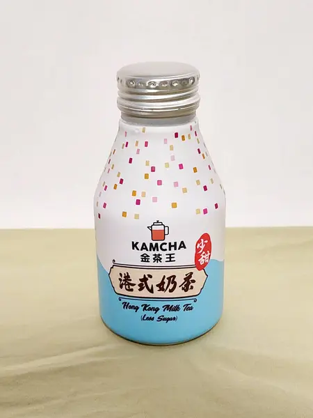 stock image JORDAN ,HK - MAY 27 - Kamcha Hong Kong style milk tea low sugar bottle on May 27, 2024 in Jordan, Hong Kong. Kamcha is a company that produces milk tea in Hong Kong.