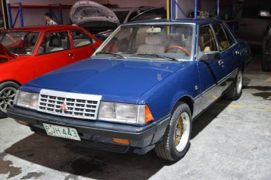 QUEZON ŞEHRİ, PH - 10 AUG Mitsubishi Lancer 10 Ağustos 2024 'te Quezon City, Filipinler' de Wheels United Fuarı 'nda. Wheels United, Filipinler 'de düzenlenen bir otomobil fuarıdır..