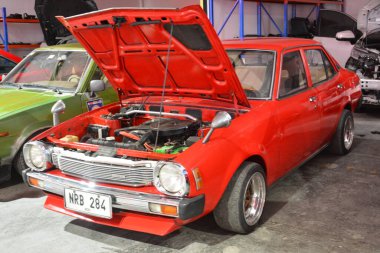 QUEZON ŞEHRİ, PH - 10 AUG Mitsubishi Lancer 10 Ağustos 2024 'te Quezon City, Filipinler' de Wheels United Fuarı 'nda. Wheels United, Filipinler 'de düzenlenen bir otomobil fuarıdır..