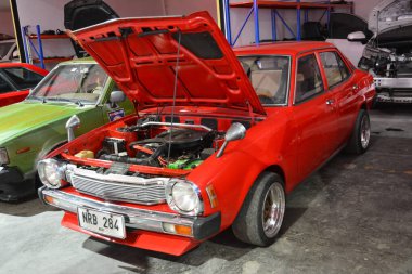 QUEZON ŞEHRİ, PH - 10 AUG Mitsubishi Lancer 10 Ağustos 2024 'te Quezon City, Filipinler' de Wheels United Fuarı 'nda. Wheels United, Filipinler 'de düzenlenen bir otomobil fuarıdır..