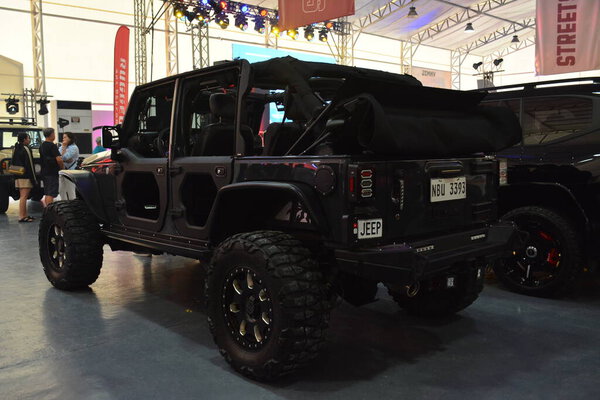 PASIG, PH - AUG 31 - Jeep wranger на Street Show 31 августа 2024 года в Пхенчхане, Филиппины. На Филиппинах проходит уличное шоу-рум.
