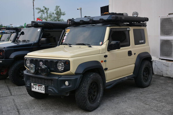 PASIG, PH - AUG 31 - Suzuki Jimny на Street Show 31 августа 2024 года в Пхенчхане, Филиппины. На Филиппинах проходит уличное шоу-рум.