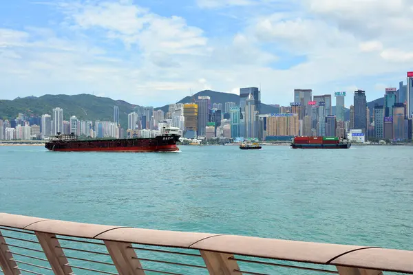 stock image ADMIRALTY, HK - MAY 28 - Victoria harbour skyscrapers view on May 28, 2024 in Admiralty, Hong Kong. Victoria harbour is a harbour separating Hong Kong island in the south and Kowloon to the north.