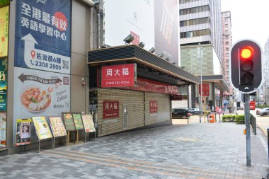 JORDAN, HK - MAY 28 - Chow tai fook facade at Nathan road on May 28, 2024 in Jordan, Hong Kong. Chow tai fook is a Hong Kong based, privately owned conglomerate with holdings in jewellery and other businesses. clipart