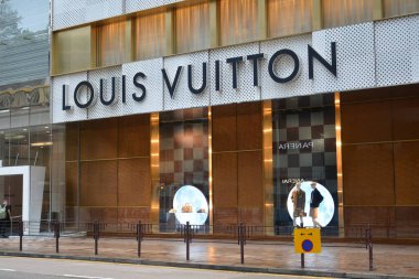 TSIM SHA TSUI, HK - MAY 28 - Louis vuitton store facade at Canton road on May 28, 2024 in Tsim Sha Tsui, Hong Kong. Louis vuitton is a French luxury fashion house and company founded in 1854. clipart