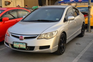 PARANAQUE, PH - OCT 19 - Honda Civic 19 Ekim 2024 tarihinde Paranaque, Filipinler 'de buluşacak. FD Takımı, Filipinler 'de düzenlenen bir otomobil kulübü etkinliğidir..