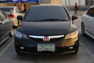 PARANAQUE, PH - OCT 19 - Honda Civic 19 Ekim 2024 tarihinde Paranaque, Filipinler 'de buluşacak. FD Takımı, Filipinler 'de düzenlenen bir otomobil kulübü etkinliğidir..