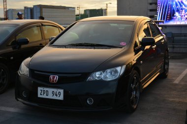 PARANAQUE, PH - OCT 19 - Honda Civic 19 Ekim 2024 tarihinde Paranaque, Filipinler 'de buluşacak. FD Takımı, Filipinler 'de düzenlenen bir otomobil kulübü etkinliğidir..