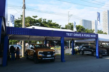 Pasay, PH - OCT 27 - PIMS veya Filipin Uluslararası Otomobil Fuarı 'nda Ford test sürüşü standı 27 Ekim 2024, Pasay, Filipinler. PIMS, Filipinler 'de her iki yılda bir düzenlenen bir otomobil etkinliğidir..