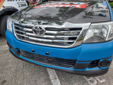 Pasay, PH-NOV 9 - PMX veya Filipin motor sporları fuarında 9 Kasım 2024 tarihinde, Pasay, Filipinler 'de Toyota hilux. PMX, Filipinler 'de düzenlenen yıllık bir yarış arabası etkinliğidir..