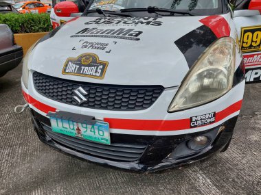 Pasay, PH - NOV 9 - Suzuki Swift, 9 Kasım 2024 tarihinde PMX veya Filipin motor sporları fuarında. PMX, Filipinler 'de düzenlenen yıllık bir yarış arabası etkinliğidir..