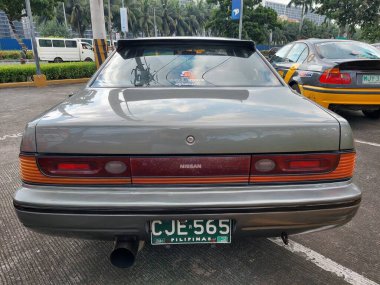 Pasay, PH - NOV 9 - Nissan cefiro PMX veya Filipin motor sporları fuarında 9 Kasım 2024 tarihinde Pasay, Filipinler 'de. PMX, Filipinler 'de düzenlenen yıllık bir yarış arabası etkinliğidir..