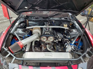 Pasay, PH-NOV 9 - 9 Kasım 2024 tarihinde PMX veya Filipin motor sporları fuarında yarış otomobili. PMX, Filipinler 'de düzenlenen yıllık bir yarış arabası etkinliğidir..