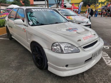 PAsay, PH - NOV 9 - PMX veya Filipin motor sporları fuarında Honda civic 9 Kasım 2024 tarihinde Pasay, Filipinler 'de. PMX, Filipinler 'de düzenlenen yıllık bir yarış arabası etkinliğidir..