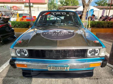 Pasay, PH - NOV 9 - PMX veya Filipin motor sporları fuarında 9 Kasım 2024 tarihinde Pasay, Filipinler 'de Toyota corolla. PMX, Filipinler 'de düzenlenen yıllık bir yarış arabası etkinliğidir..