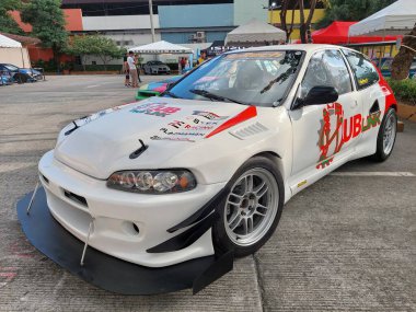 PAsay, PH - NOV 9 - PMX veya Filipin motor sporları fuarında Honda civic 9 Kasım 2024 tarihinde Pasay, Filipinler 'de. PMX, Filipinler 'de düzenlenen yıllık bir yarış arabası etkinliğidir..