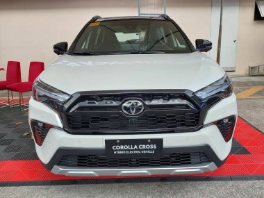 Pasay, PH-NOV 9 - PMX veya Filipin motor sporları fuarında 9 Kasım 2024 tarihinde Pasay, Filipinler 'de Toyota corolla çaprazlaması. PMX, Filipinler 'de düzenlenen yıllık bir yarış arabası etkinliğidir..