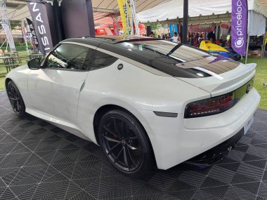 Pasay, PH - NOV 9 - Nissan Fairlady z, 9 Kasım 2024 tarihinde PMX veya Filipin motor sporları fuarında. PMX, Filipinler 'de düzenlenen yıllık bir yarış arabası etkinliğidir..