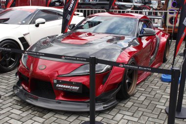 Pasay, PH-DEC 7 - Toyota supra gr 7 Aralık 2024 tarihinde Filipinler 'in Pasay kentinde çarpışan araba fuarında. Tampon 2, Filipinler 'de düzenlenen bir piyasa sonrası araba fuarıdır..