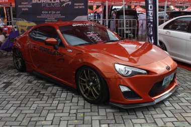 Pasay, PH-DEC 7 - Toyota 86 tampon 2 araba fuarında 7 Aralık 2024 tarihinde Pasay, Filipinler 'de. Tampon 2, Filipinler 'de düzenlenen bir piyasa sonrası araba fuarıdır..