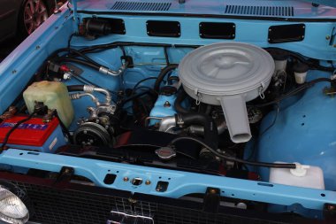 Pasay, PH-DEC 7 - Toyota corona motoru 7 Aralık 2024 tarihinde Filipinler 'in Pasay kentinde çarpışan araba fuarında. Tampon 2, Filipinler 'de düzenlenen bir piyasa sonrası araba fuarıdır..
