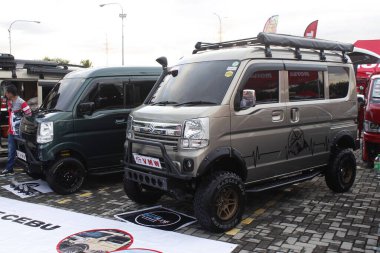 PASAY, PH - DEC 7 - Suzuki every wagon at bumper 2 bumper car show on December 7, 2024 in Pasay, Philippines. Bumper 2 bumper is a aftermarket car show event held in Philippines. clipart