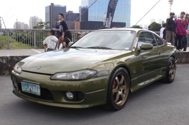 PASIG, PH - NOV 23 - Nissan silvia at DBTK Auto Salon on November 23, 2024 in Pasig, Philippines. Dont Blame the Kids or DBTK Auto Salon is a car show event held in Philippines. clipart